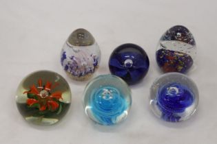 SIX GLASS PAPERWEIGHTS