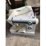 A NEW HOME ELECTRIC SEWING MACHINE