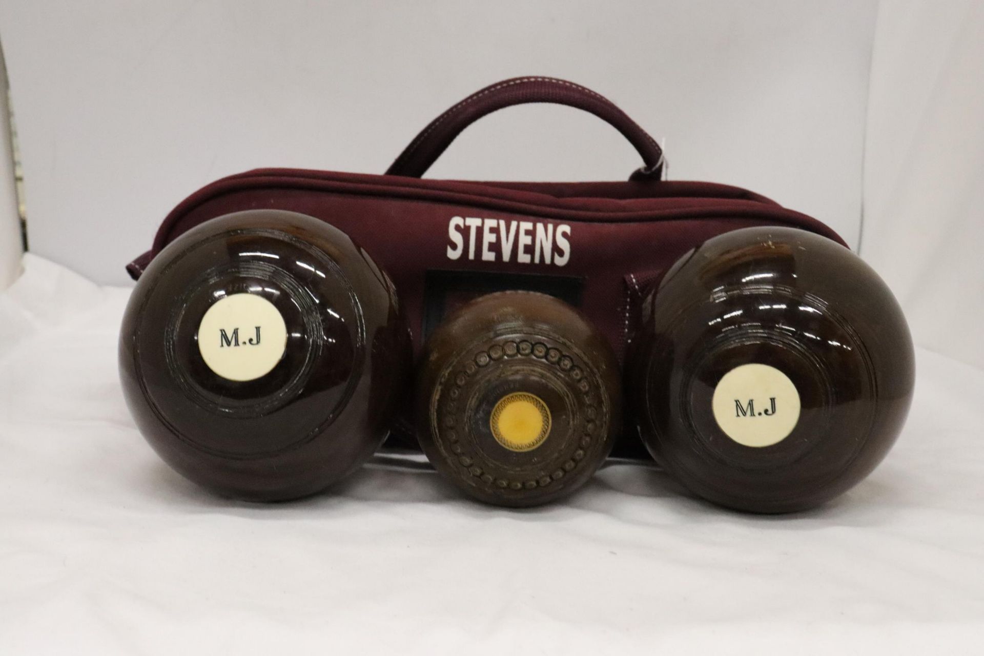 TWO R G LAWRIE BOWLING BOWLS AND A JACK IN A BAG
