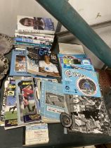 A COLLECTION OF MANCHESTER CITY MEMORABLIA TO INCLUDE, 9 BOOKS, 50 PROGRAMMES, FIVE LARGE ACTION