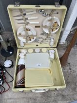 A RETRO BREXTON PICNIC HAMPER WITH CONTENTS (MISSING ONE FLASK)