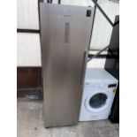 A TALL UPRIGHT SILVER SAMSUNG FREEZER BELIEVED IN WORKING ORDER BUT NO WARRANTY