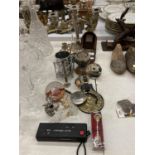 A MIXED LOT TO INCLUDE A CANDLEABRA, PAPERWEIGHT, HORSE BRASS, SILVER PLATED ITEMS, BRASS, A CAMERA,