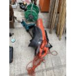 THREE GARDEN ITEMS TO INCLUDE A FLYMO LEAF VAC AND A BLACK AND DECKER ELECTRIC CHAINSAW ETC