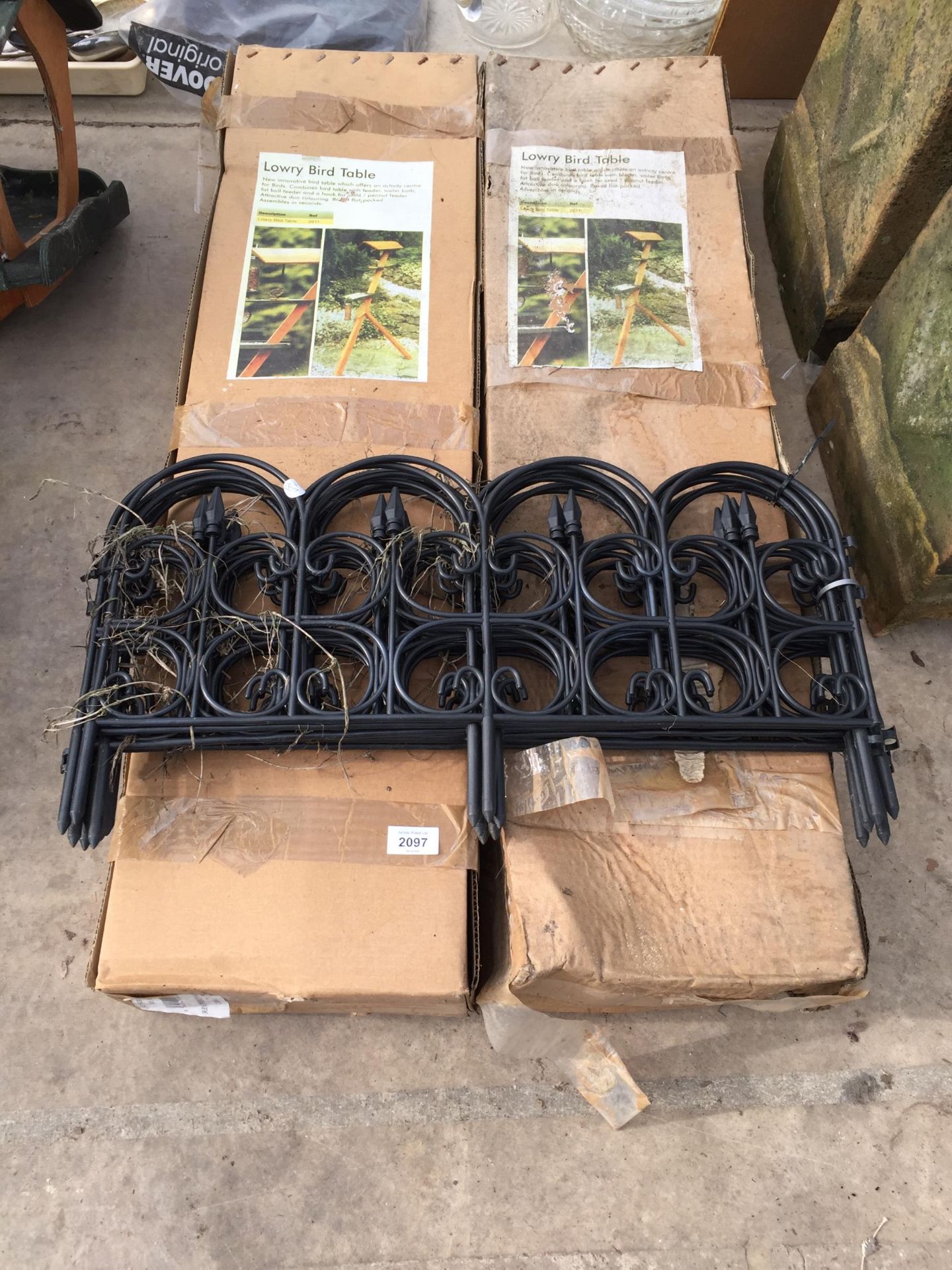 TWO BOXED BIRD TABLES AND PLASTIC BOARDER EDGING