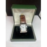 A GIVENCHY PARIS WRIST WATCH IN A PRESENTATION BOX