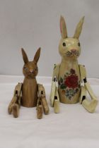 TWO WOODEN SHELF RABBITS