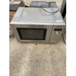 A SILVER BOSCH MICROWAVE OVEN