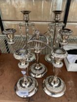 TWO PAIRS OF SILVER PLATED CANDLESTICKS AND A FURTHER TWISTED TWO BRANCH CANDLESTICK