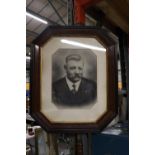 A VINTAGE PHOTOGRAPHIC PRINT OF A MAN, IN A MAHOGANY OCTAGONAL FRAME