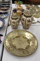 A VINTAGE BRASS CHARGER TOGETHER WITH TWO BRASS HANDPAINTED LIDDED JARS