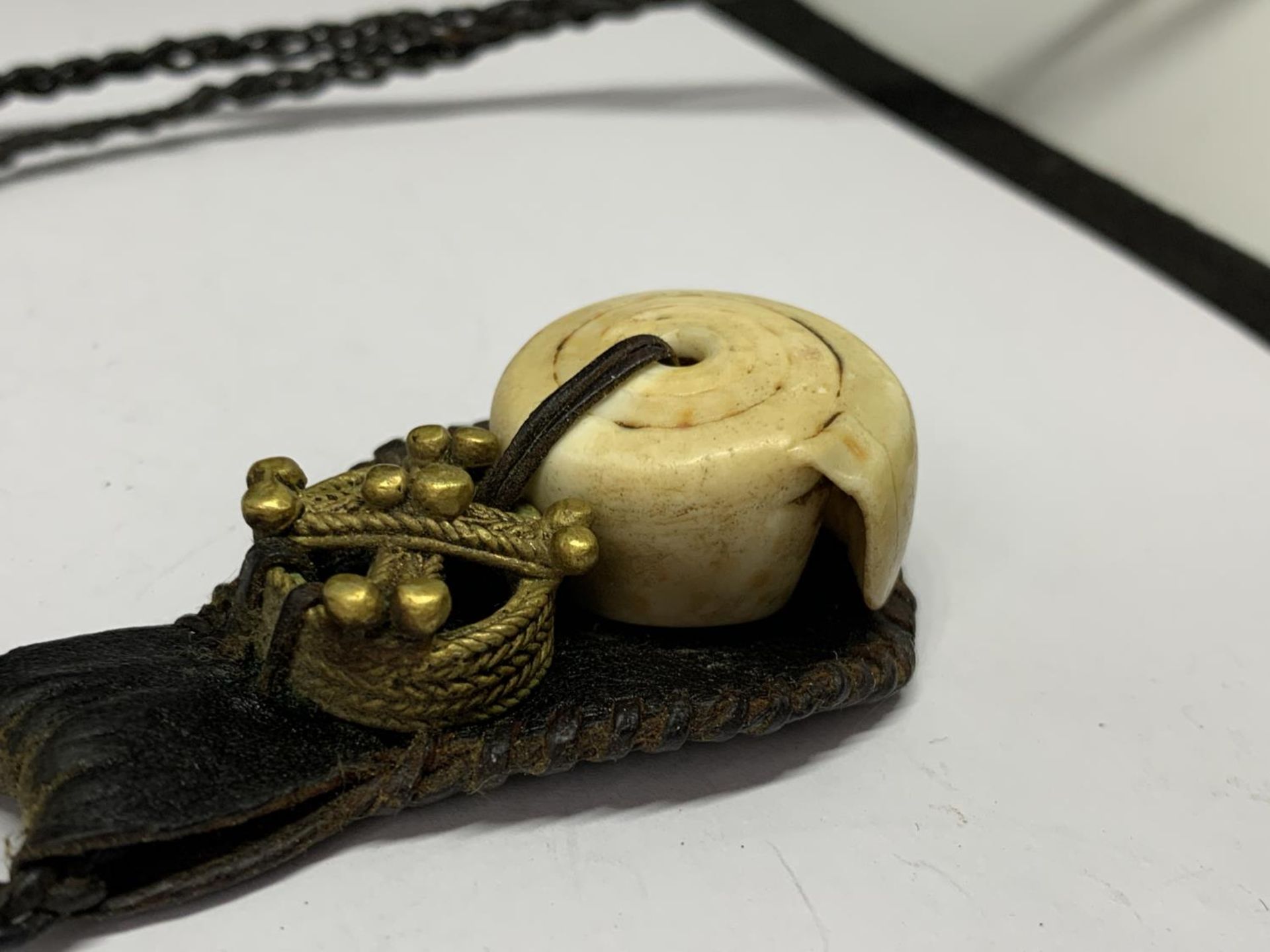 A TALISMAN GOOD LUCK AMULET ON LEATHER CORD - Image 4 of 4