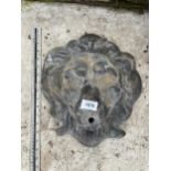A LEAD LION HEAD WATER FEATURE PLAQUE