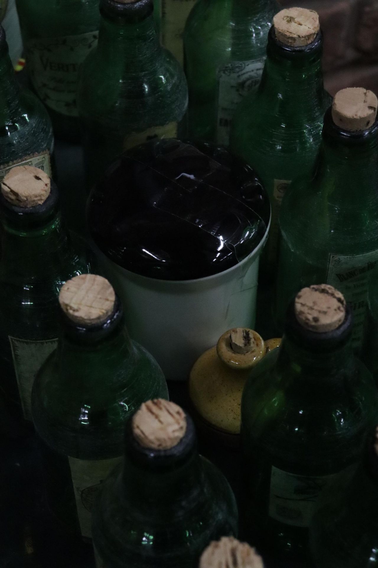 A LARGE COLLECTION OF VINTAGE GREEN BOTTLES WITH CORKS TO INCLUDE EXTRACT OF TOAD, SLUG REPELLENT, - Image 6 of 7
