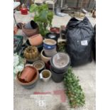 A LARGE ASSORTMENT OF GARDEN ITEMS TO INCLUDE TERRACOTTA POTS, PLANTS AND EDGING ETC