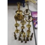 A QUANTITY OF BRASS CANDLESTICKS