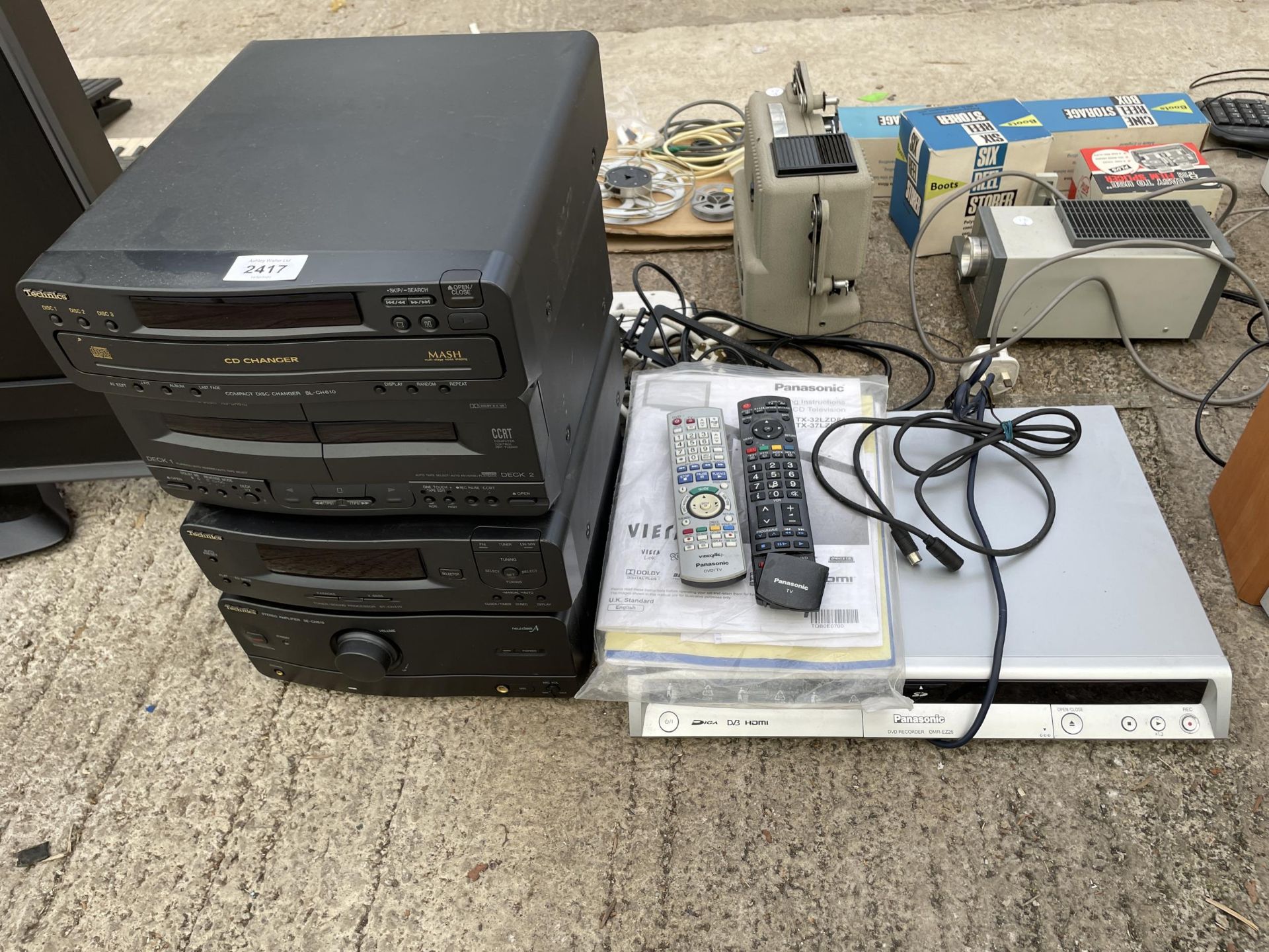 AN ASSORTMENT OF ITEMS TO INCLUDE A TECHNICS STEREO SYSTEM AND A PANASONIC DVD PLAYER
