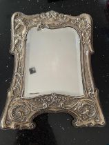 A HALLMARKED BIRMINGHAM SILVER ART NOVEAU MIRROR 33CM X 24CM