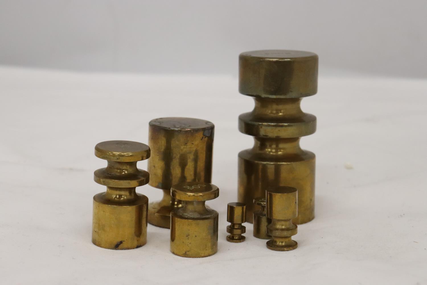 A SET OF BRASS WEIGHTS - Image 4 of 4