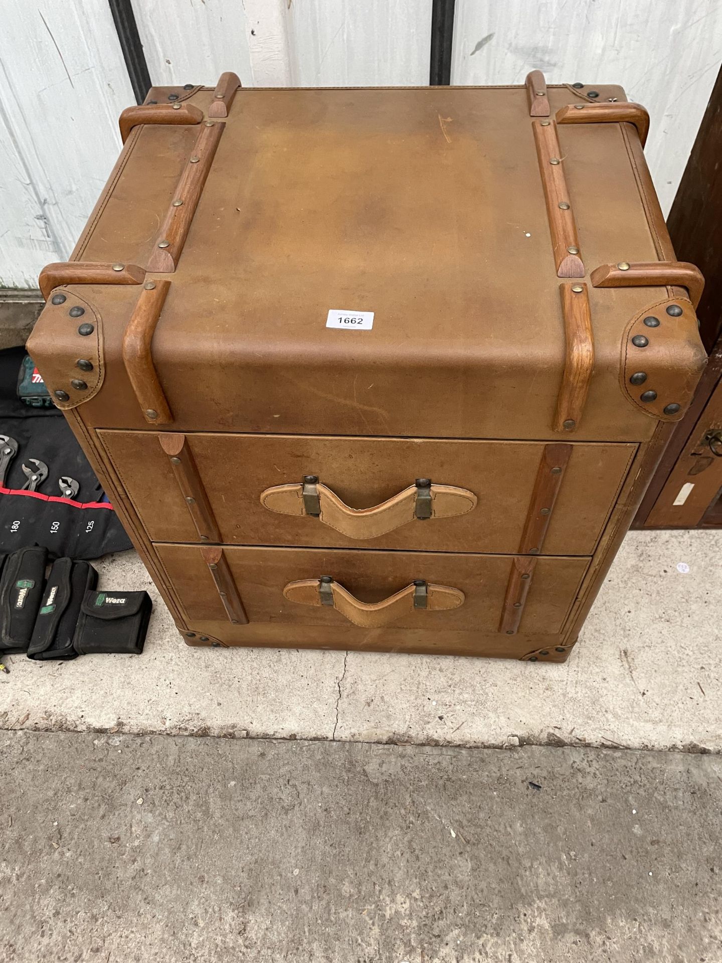A CHEST OF TWO DRAWERS IN THE FORM OF A SUITCASE