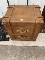 A CHEST OF TWO DRAWERS IN THE FORM OF A SUITCASE