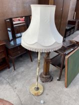 A MODERN ONYX AND BRASS STANDARD LAMP WITH SHADE