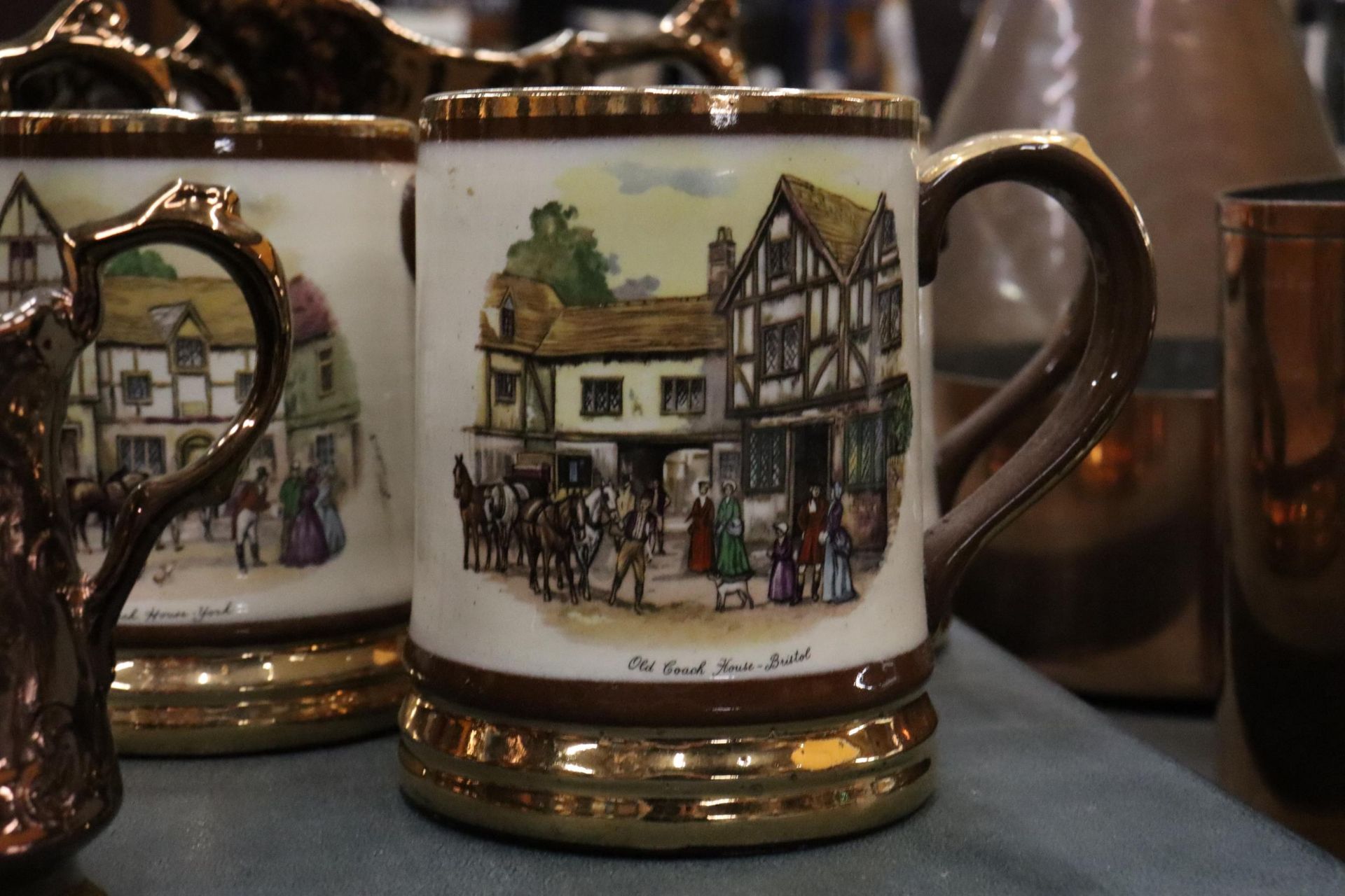 FIVE VINTAGE BRONZE LUSTRE WARE JUGS TOGETHER WITH THREE ARTHUR WOOD TANKARDS WITH COACHING SCENES - Image 3 of 7