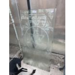 A PANE OF FROSTED GLASS ETCHED 'NBC'