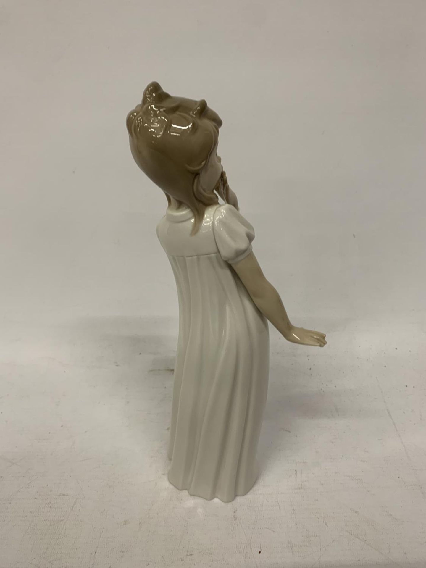 A LARGE NAO FIGURE OF A GIRL YAWNING - Image 2 of 3