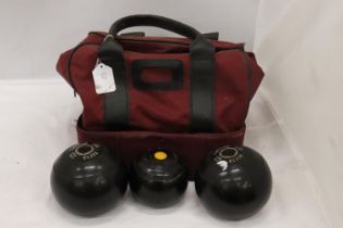 A PAIR OF THOMAS TAYLOR BOWLS AND A JACK IN A BAG