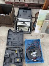 AN ASSORTMENT OF ITEMS TO INCLUDE A TYPEWRITER AND A BATTERY CHARGER ETC