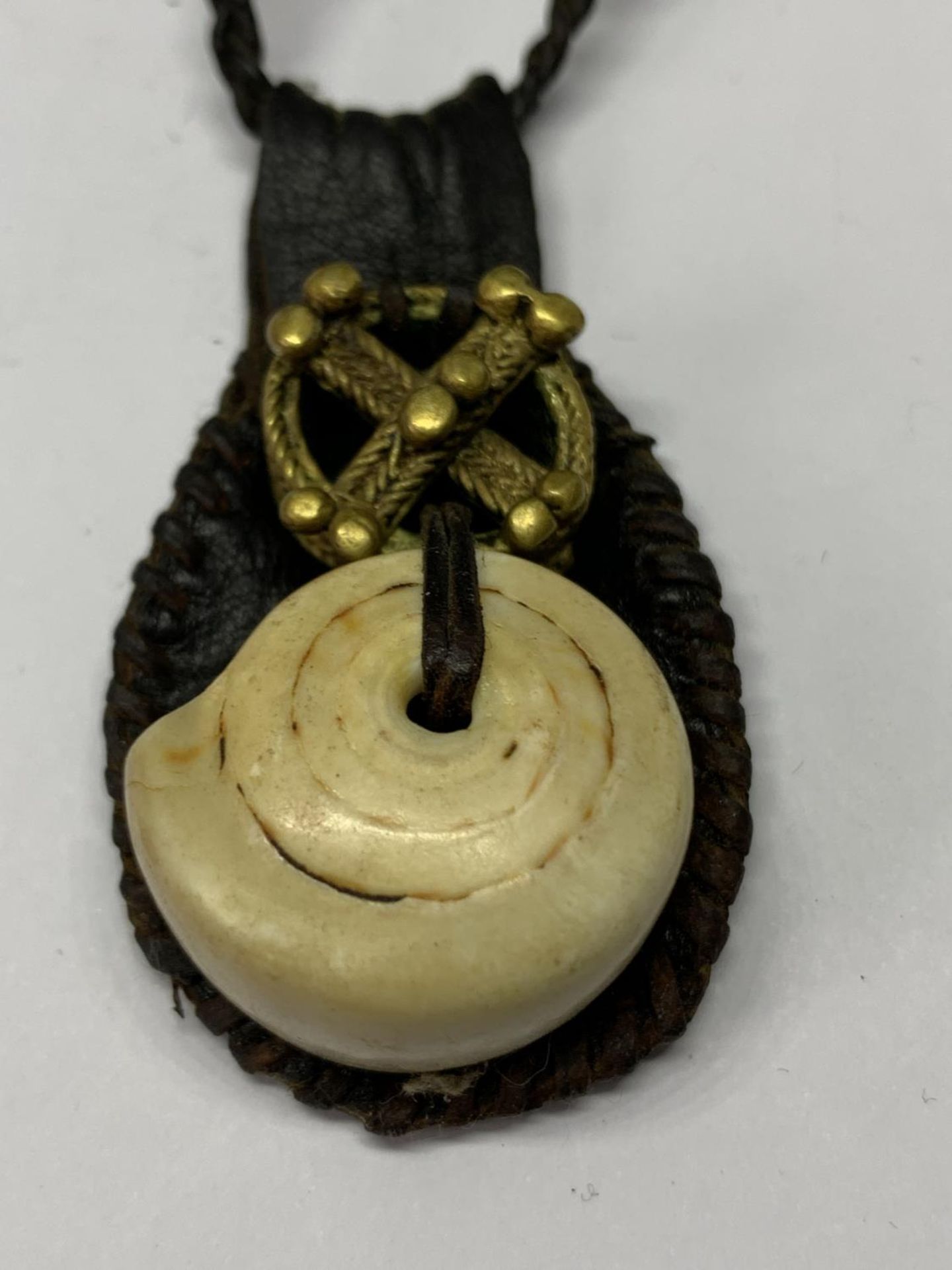 A TALISMAN GOOD LUCK AMULET ON LEATHER CORD - Image 2 of 4