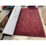 A MODERN RED RUG