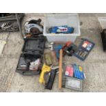 AN ASSORTMENT OF TOOLS TO INCLUDE A NUTOOL RIP SAW, A PALM SANDER AND NAIL GUNS ETC