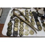 A LARGE COLLECTION OF VINTAGE HORSE BRASSES, ETC TO INCLUDE HORSE HAMES, HORSE BRASSES ON