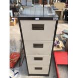 A METAL FOUR DRAWER FILING CABINET