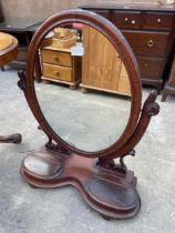 A VICTORIAN MAHOGANY OVAL SWING FRAME DRESSING MIRROR WITH TWO JEWELLERY COMPARTMENTS