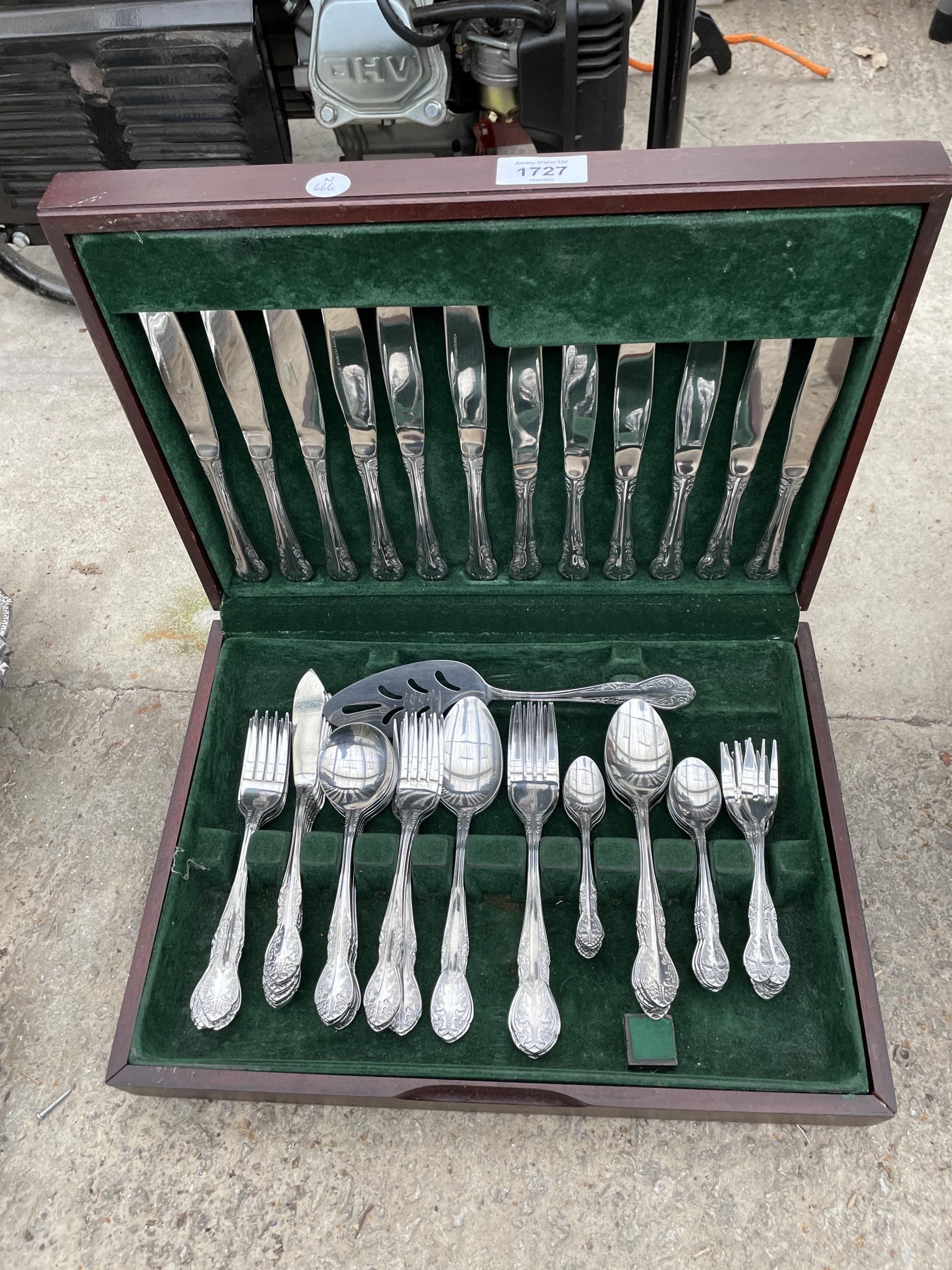 A BELIEVED COMPLETE MAHOGANY CASED CANTEEN OF CUTLERY