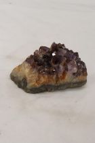 AN AMETHYST DRUZE GEODE QUART CRYSTAL