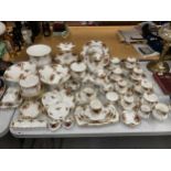 A VERY LARGE COLLECTION OF ROYAL ALBERT OLD COUNTRY ROSES TO INCLUDE TRIOS, JUGS, SUGAR BOWLS,