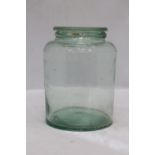 A VINTAGE NUTTALL & CO GLASS JAR WITH LID