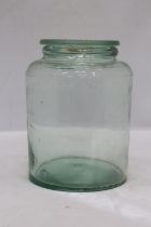 A VINTAGE NUTTALL & CO GLASS JAR WITH LID