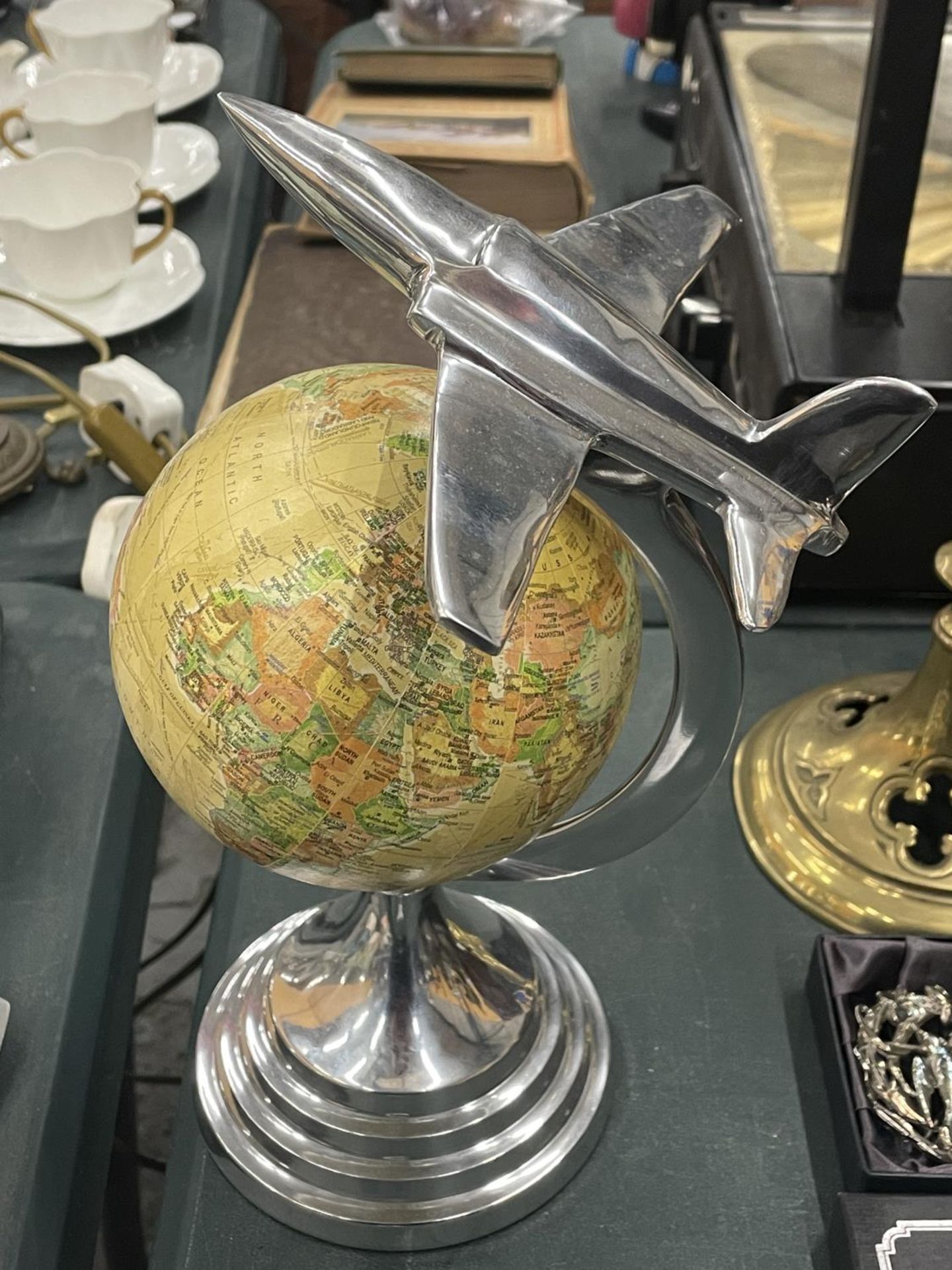 AN ART DECO CHROME JET ON A GLOBE PEDESTAL - Image 2 of 4