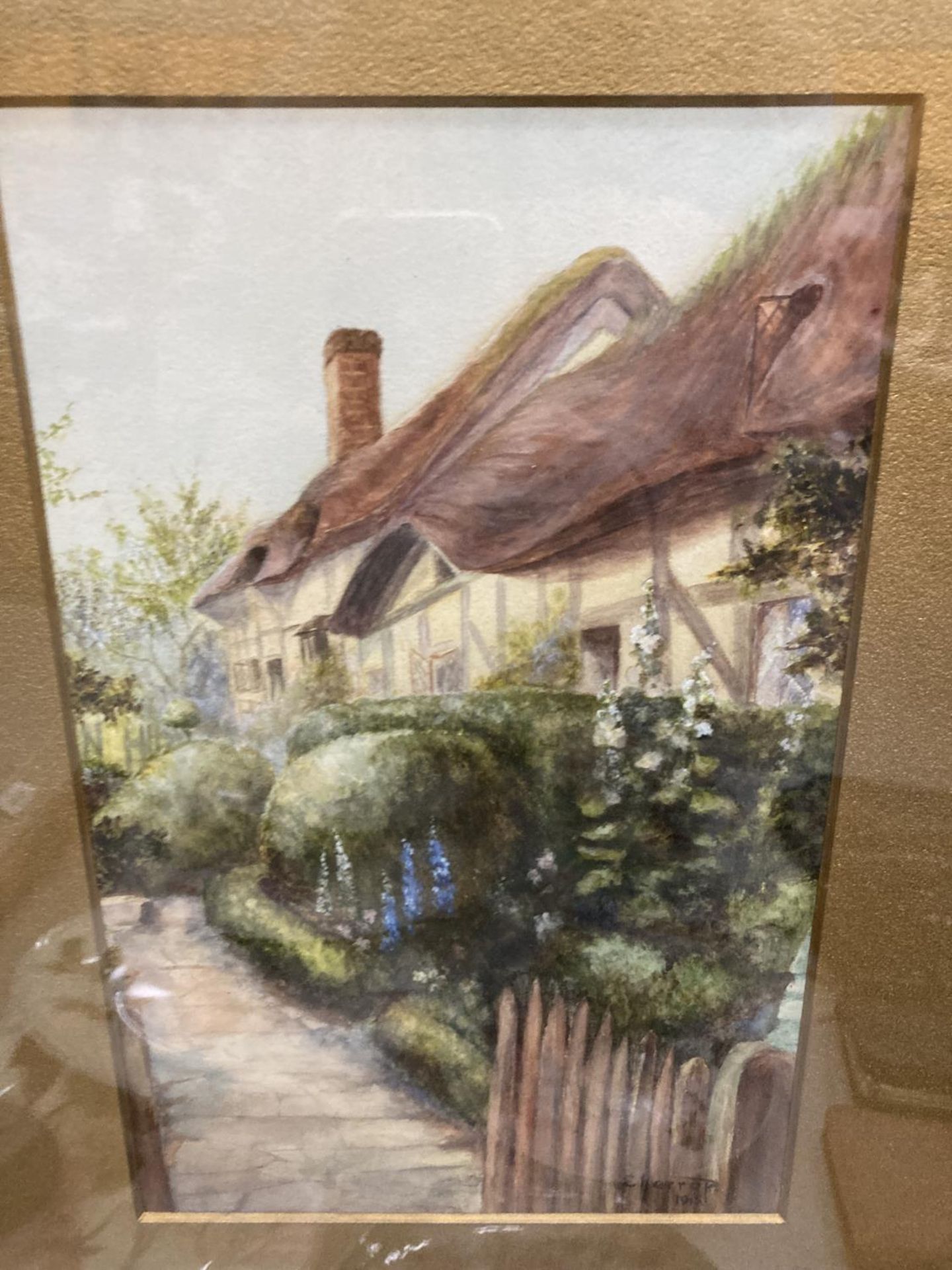 A FRAMED WATERCOLOUR OF A THATCHED COTTAGE, SIGNED E HARROP, 1915 - Image 2 of 3