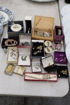 A LARGE QUANTITY OF COSTUME JEWELLERY AND ENAMEL TRINKET B0XES