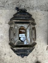 A VINTAGE AND DECORATIVE GLASS WALL LANTERN