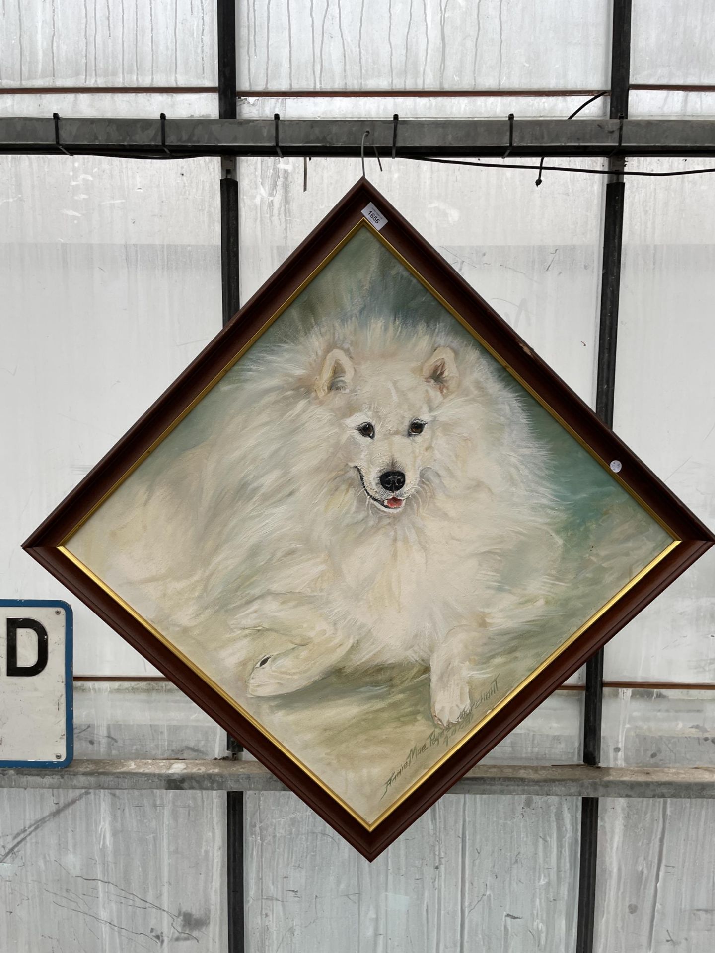 A FRAMED OIL ON CANVAS OF A LARGE DOG