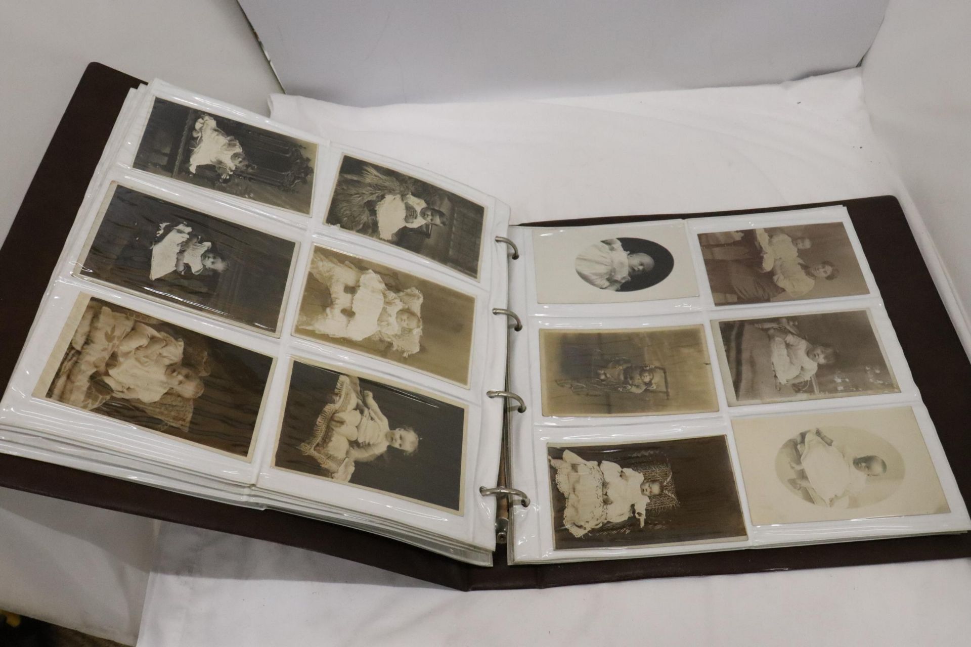AN ALBUM CONTAINING A COLLECTION OF SEPIA VICTORIAN PHOTOGRAPHS - Bild 4 aus 5