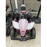 A PINK CHILDS PETROL GO KART COMPLETE WITH KEY