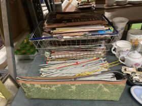 A COLLECTION OF VINTAGE KNITTING NEEDLES AND PATTERNS